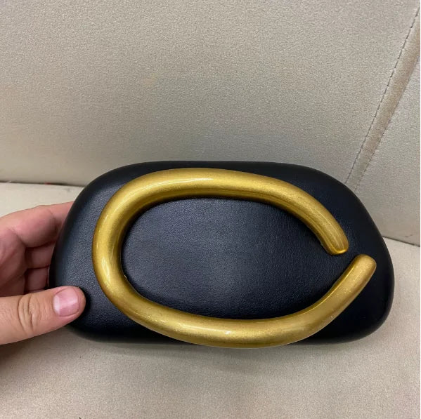 Gold Closure Box Clutch worn crossbody
