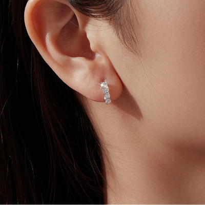 BAMOER Elegant Moissanite Stud Earrings worn