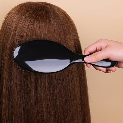 Detangling Brush & Scalp Massager Comb in use