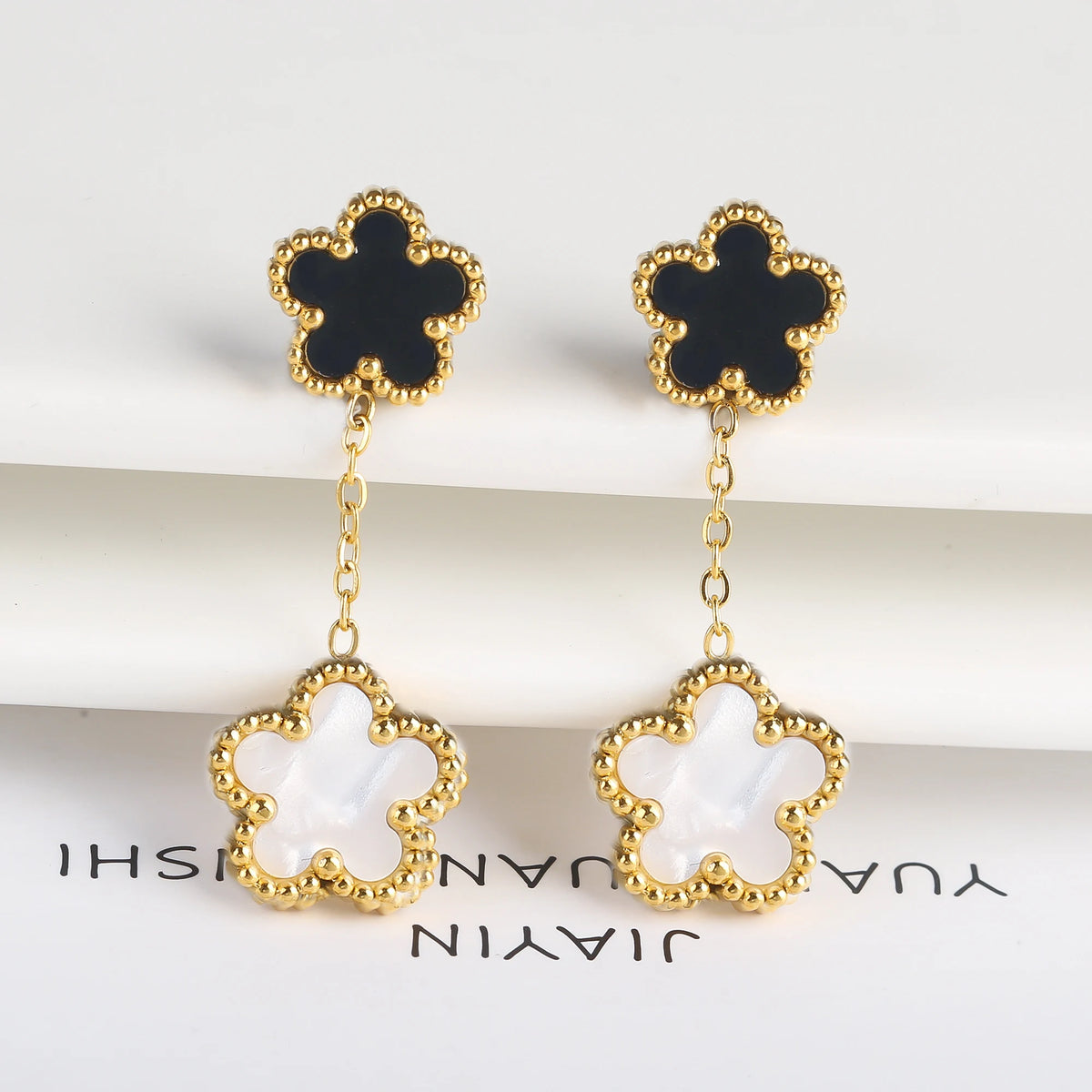 Five-Leaf Flower Drop Earrings worn