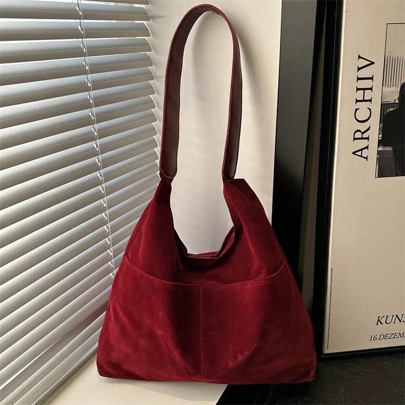 Women's Multi-Pocket Tote Bag worn on shoulder