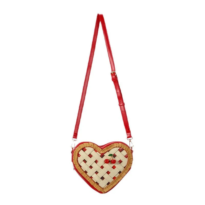 Heart-Shaped Cherry Crossbody Bag worn crossbody
